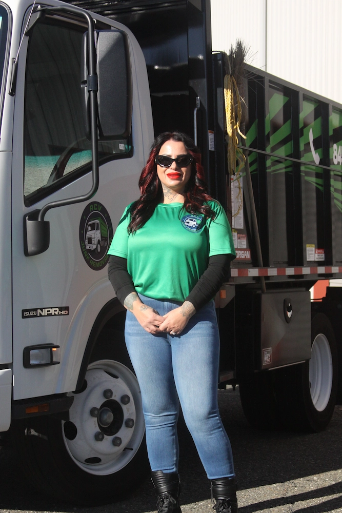 Cleaning services lead standing by the truck